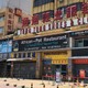 An African restaurant closed off along with other businesses in Guangzhou after several people tested positive for the novel coronavirus disease there April 13, 2020.